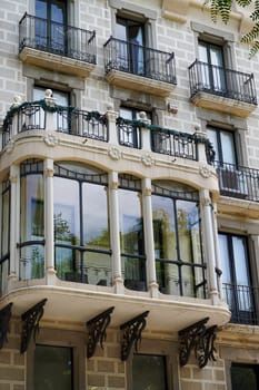 Beautiful balcony of a city house in a historic place in Spain.