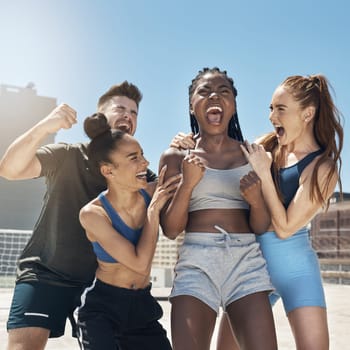 Fitness, happy and friends in workout celebration in the city on a rooftop with achievement. Diversity, happiness and people celebrating sports victory for success, motivation and outdoor exercise