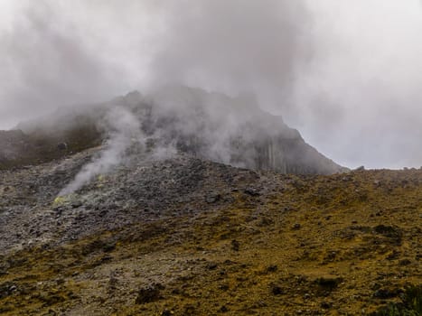 Active volcano Sibayak with smoke and fumaroles. Sumatra, Indonesia.
