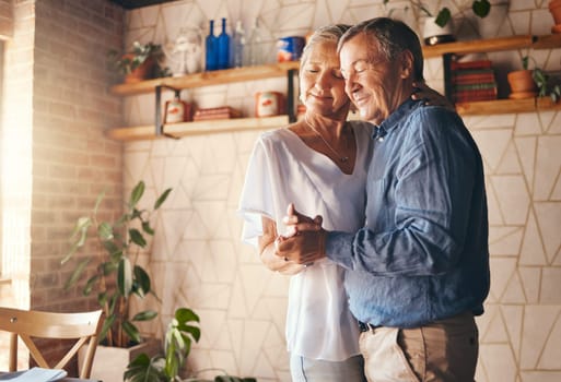 Dance, old couple and love holding hands dancing to music at home in memory of a happy marriage, romance and anniversary. Senior woman enjoy quality time, bonding and romantic retirement with partner.