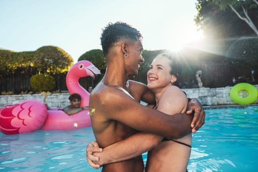 Pool party, love and couple hug, having fun and bonding together. Swimming, romance diversity and man and woman hugging, cuddle or laugh at funny joke in water at summer event or new year celebration.