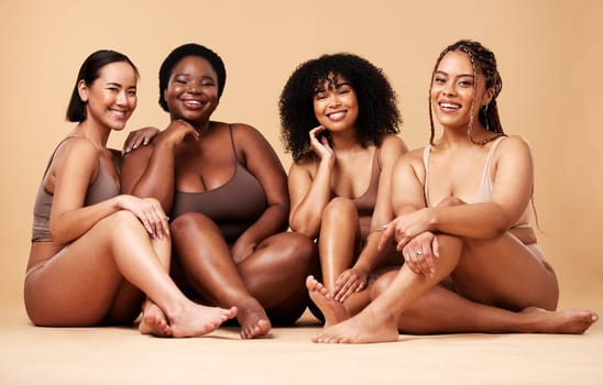 Diversity women, portrait and natural body and skin of group together for inclusion, beauty and power. Aesthetic model people or friend on beige background with pride and motivation for self love.
