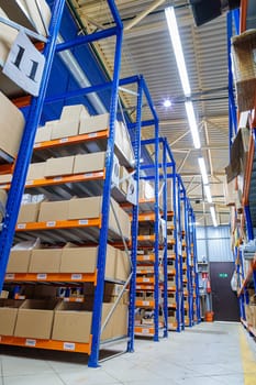 High racks in the warehouse of goods. High quality photo