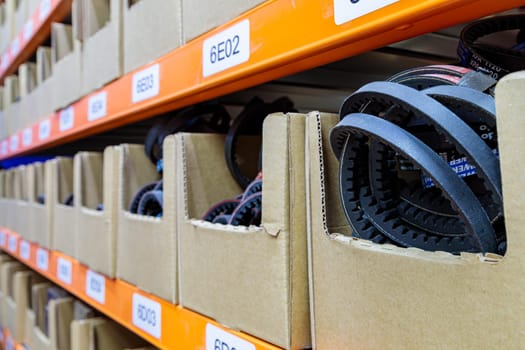 Boxes on racks in a warehouse of goods close-up. High quality photo