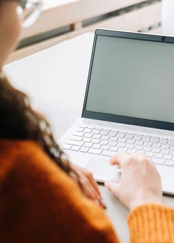 Remote Learning with Laptop: Woman Student Viewing Blank Screen Mockup for E-Learning Website, Online Education and Working Remotely.