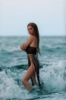 Model pose in modern swimwear by sea. Beautiful sexy lady on tropical beach. Relax portrait of young sunbathing beauty. Summer vibes on the beach