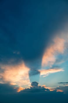 Real amazing sunset sky with gentle colorful clouds