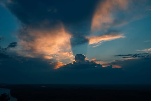 Real amazing sunset sky with gentle colorful clouds