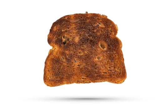 Isolate of one slice of burnt slice of toaster bread. Toasted whole grain bread isolated on white background. The concept of inability to cook, burnt food, dish or pastry