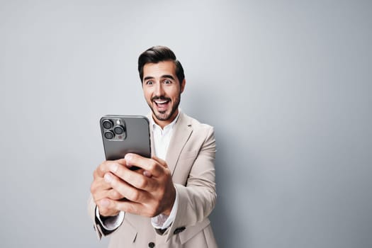 call man phone message business internet happy hold adult portrait selfies background smile lifestyle connection businessman holding cellphone suit smartphone communication