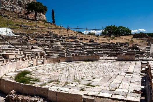 ATHENS, GREECE - 06/23/2013 - The Theatre of Dionysus Eleuthereus is a major theatre in Athens, Greece. The Theatre built at the foot of the Athenian Acropolis and dedicated to Dionysus, the god of wine.