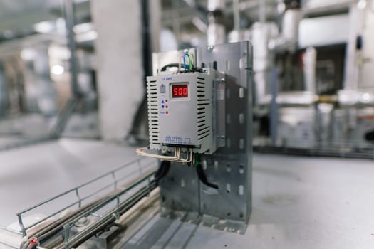 Pressure sensor in an industrial boiler room. Barometer in a heating system. Close-up.