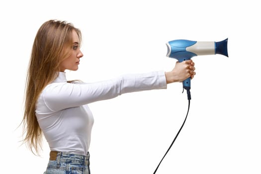Portrait of attractive cheerful girl with long hair holding hair dryer isolated on white background