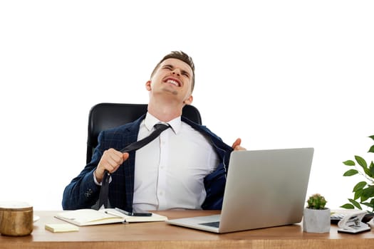 angry businessman shouting loudly, sitting on chair at desk and having problems