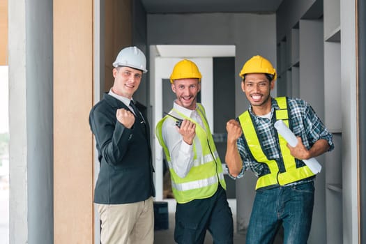 team man engineers success cheerful and protective helmet construction site industrial project in working site.