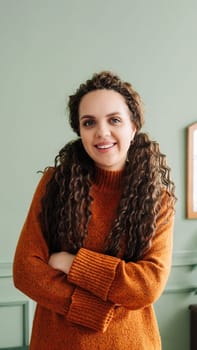Happy Professional Woman Laughing in Modern Living Room - Portrait of Cheerful Lady Smiling for Camera in Cozy Apartment or Office.