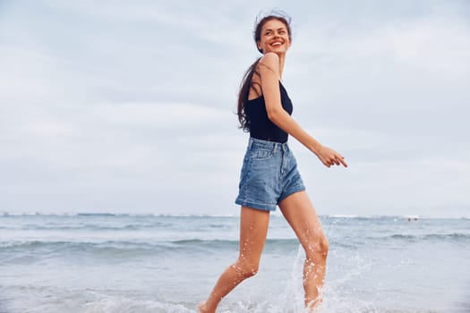 beach woman sunset sea copy ocean relax active space freedom running smile nature beautiful summer travel sexy beauty sunrise lifestyle young tan