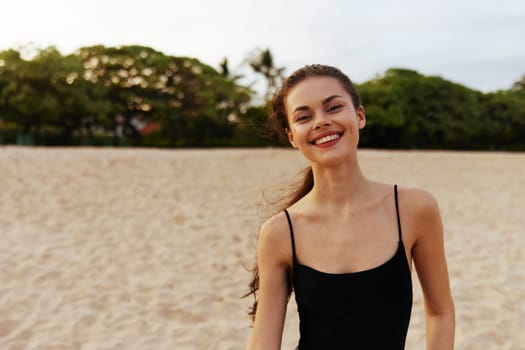 woman vacation person caucasian copy sunset travel space ocean enjoyment walking outdoor beach lifestyle sand summer happy peaceful beauty smile sea happiness