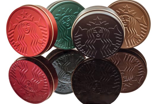 Bangkok, Thailand May 5, 2023 - The Colorful of Metal round boxes isolated on white background with clipping path. which are the Collection Series of Starbucks. They are for keeping snacks or some accessories which are reflected.