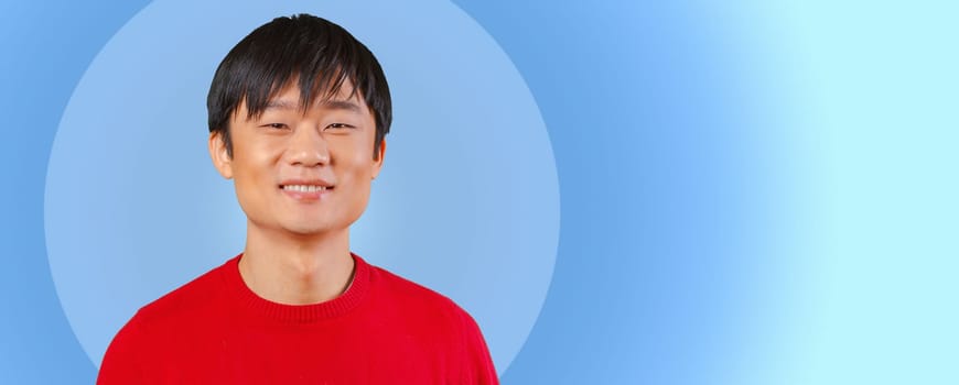 Handsome young asian man smiling