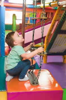 little cute boy in the playground.