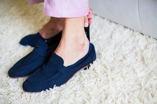 groom wears blue shoes on the wedding day