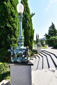 Partenit, Crimea - July 8. 2019. The bronze lanterns in Park landscape art Aivazovskoe