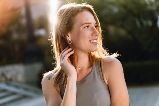 Portrait of a beautiful young woman outdoors in the city