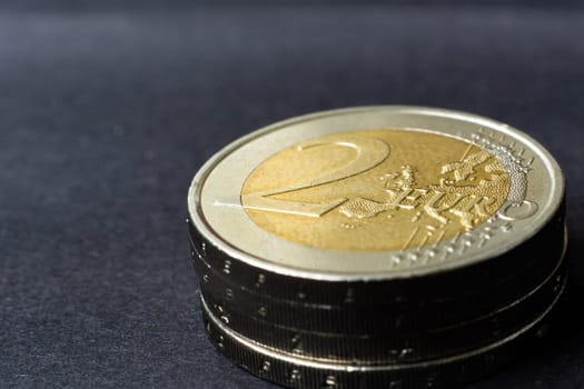 Euro close up photos. Macro coins. Soft focus, dark background