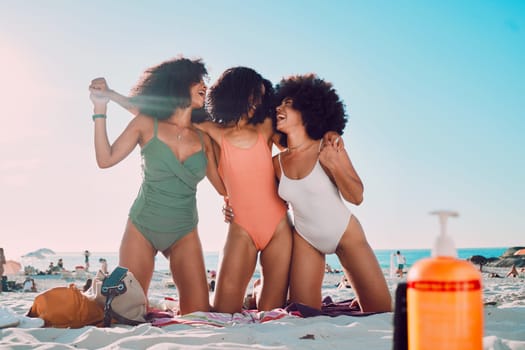 Beach friends, hug and African women happy on outdoor summer holiday for peace, freedom or friendship bonding. Ocean sand, blue sky and fun bikini girl on vacation adventure in Los Angeles California.