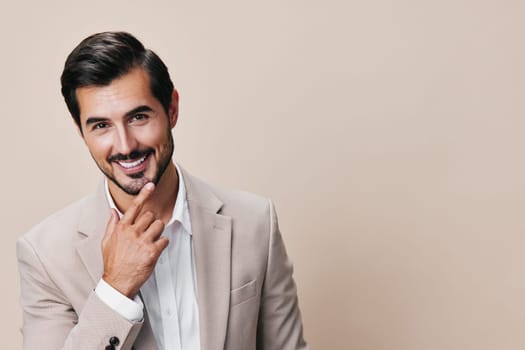 copyspace man portrait beige fashion stylish posing business businessman suit attractive isolated eyeglass handsome smiling crossed grey occupation smile model happy
