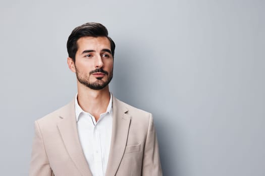 man suit white sexy isolated business office businessman attractive portrait confident beige handsome young happy success eyeglass copyspace grey job smiling