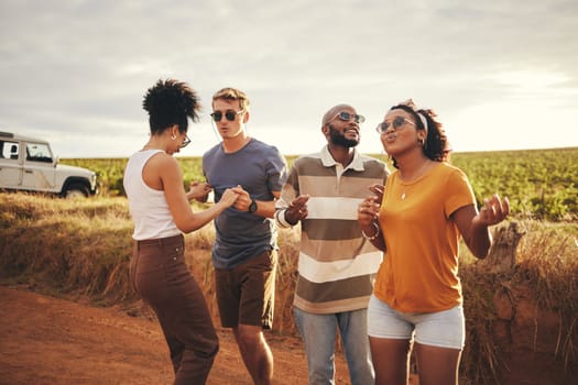 Diversity, friends and dance outdoor on holiday, vacation and relax together on dirt road trip in countryside. Group, students happy and travelling in summer for getaway or fun weekend away as couple.