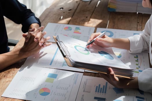 Business team analyzing income charts and graphs with modern laptop computer. Close up. Business analysis and strategy concept.