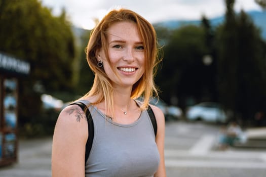 Portrait of a beautiful young woman outdoors in the city