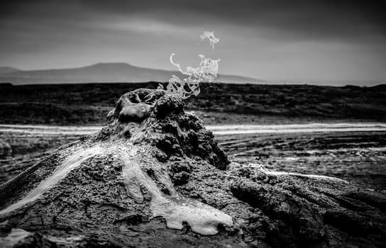 Burning gas in the mud volcanoes of Gobustan, Azerbaijan in black and white