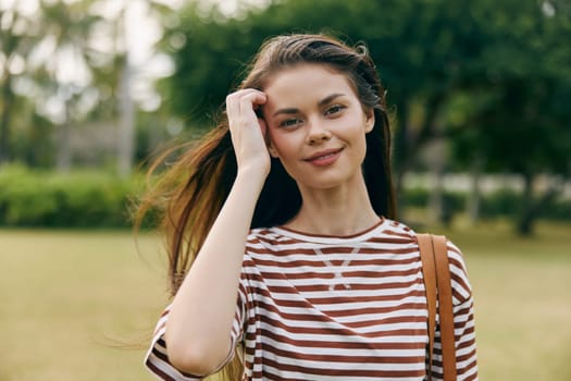 woman beauty smiling girl lifestyle park black carefree striped nature beautiful walk fashion exercise joy summer t-shirt hipster face freedom bali