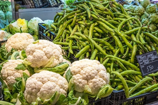 Cauliflower and beans for sale at a market