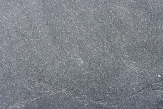 Gray granite texture on the wall.