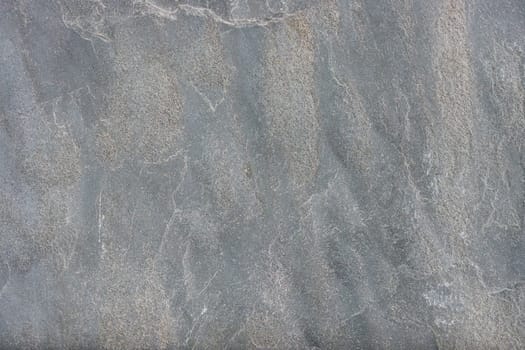 Gray granite texture on the wall.