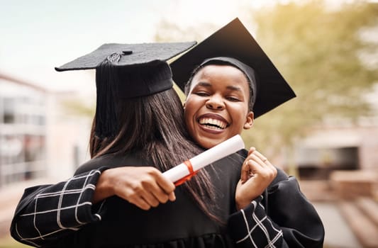 Friends, hug and graduation at college for students with a diploma and support outdoor. Graduate women excited to celebrate university achievement, education success and future at school event.