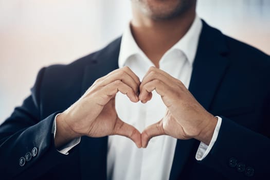 Businessman, hands and heart for love, thank you or symbol for message, icon or say for relationship. Romantic man with hand sign or voice in hearty shape emoji for loving, care or romance gesture.