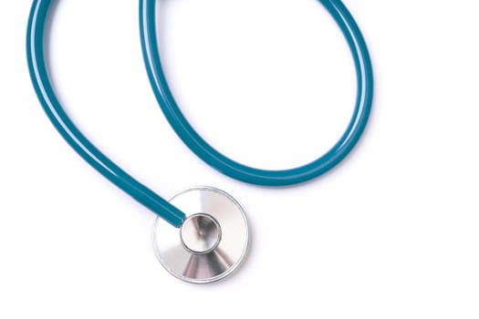Green stethoscope, object of doctor equipment, isolated on white background. Medical design concept, cut out, clipping path, top view, studio shot.