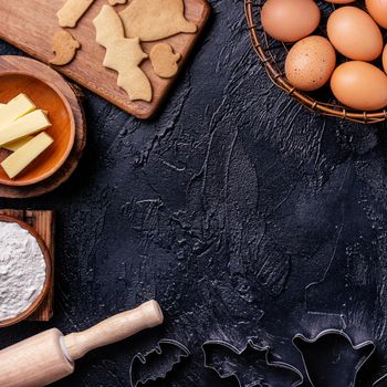 Design concept of making Halloween cookies, baking recipe ingredients layout of preparing party, top view, flat lay, overhead, blank copy space.