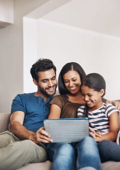 Family on a couch, happiness and tablet with connection, social media and watching a cartoon. Parents, mother and father with female child, daughter or technology for a movie, film or bonding at home.