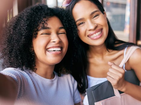 Friends, selfie and shopping date with black women, smile and happiness together with retail, sale and discount at shopping mall. Portrait, happy in photograph and freedom, customer and shop outdoor.