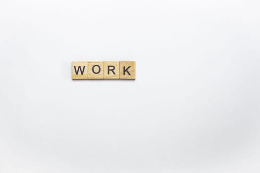 Business and work concept. Inscription with wooden cubes with letters on a white background