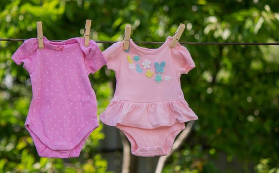 washing baby clothes. Linen dries in the fresh air. Selective focus. nature.