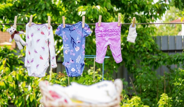 washing baby clothes. Linen dries in the fresh air. Selective focus. nature.