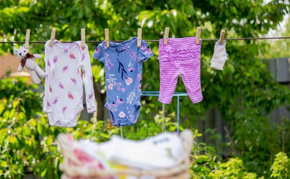 washing baby clothes. Linen dries in the fresh air. Selective focus. nature.